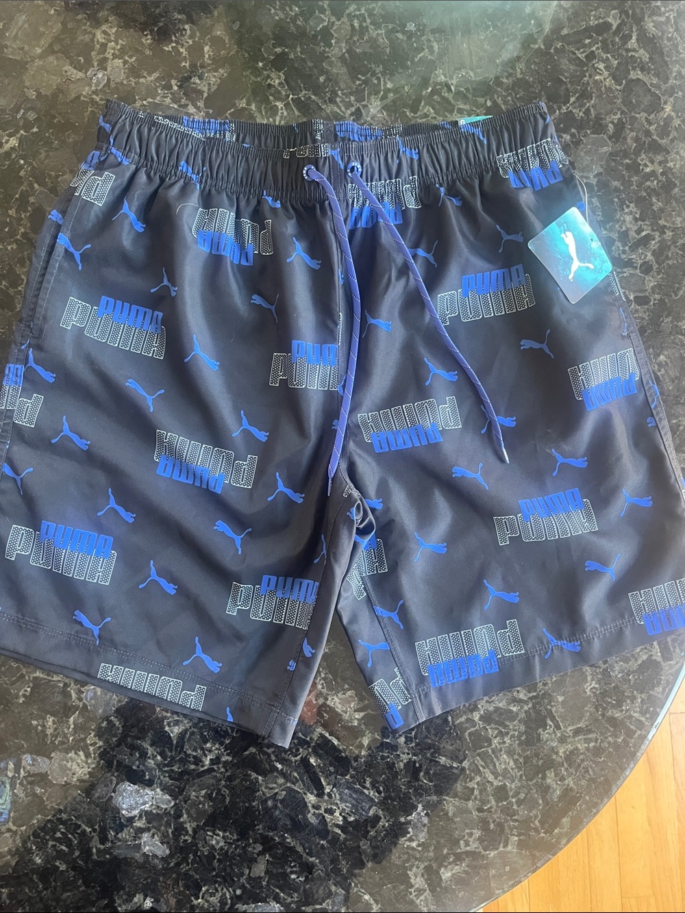 Puma Men's Black Swim Trunks with Blue Logo Print